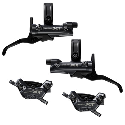 Set of Shimano XT bike brake levers on a white background, XT 4 pot brakes, best mountain bike mtb brakes.